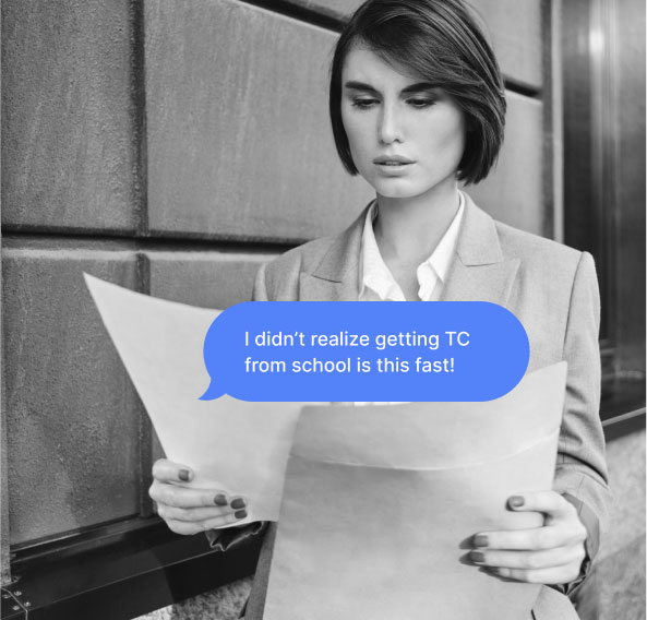 A working woman looking at documents in hand